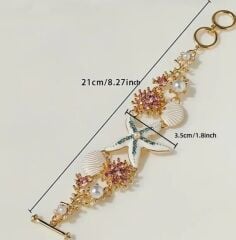 Donna Deniz Kabuğu Detaylı Ve Deniz Mercan Boncukları İle Süslenmiş Bileklik Modeli