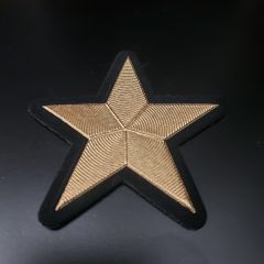 7 cm. Tela Kumaş Üzerinde Metal Yıldız Modeli