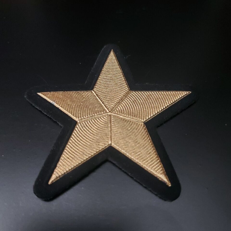 7 cm. Tela Kumaş Üzerinde Metal Yıldız Modeli