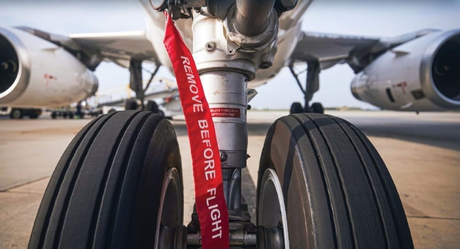 'Uçuştan Önce Kaldır 'Etiketi